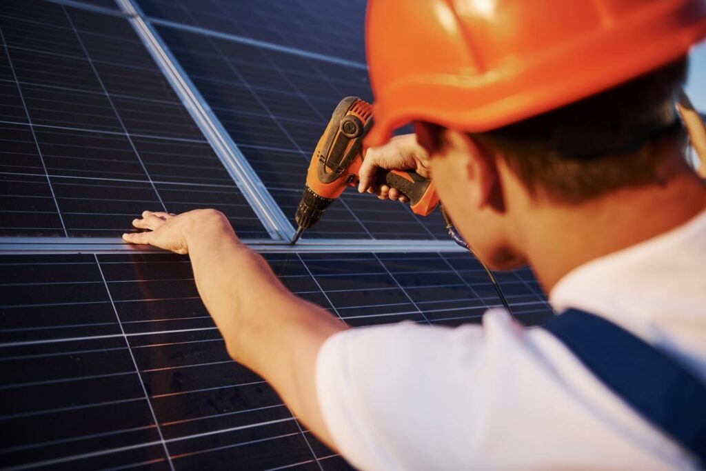 solar contractor installing roof solar panels