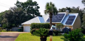 affordable alternative energy solutions - beach house with solar panels